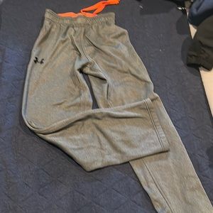 Gray under armour sweatpants with orange band, size small, excellent condition